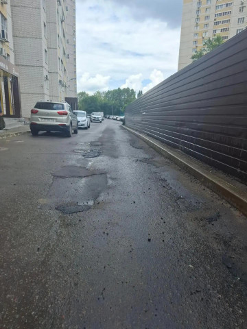 Проведение ремонтных работ дорожного покрытия в ЖК «Дельфин»